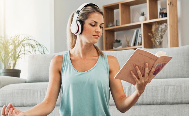 woman reading a wellness book