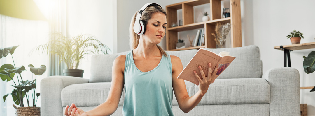 woman reading a wellness book